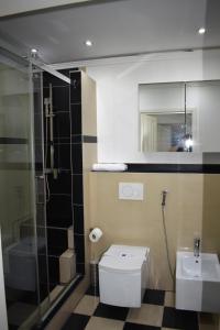 Ein Badezimmer in der Unterkunft Villaci Business Apartments