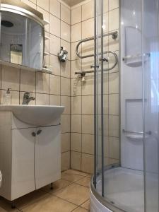 Ett badrum på Apartamentai Viktorija