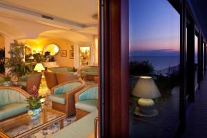 a hotel room with a view of the ocean at Le Querce Resort Sea Thermae & Spa in Ischia