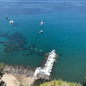 an aerial view of a marina with boats in the water at Le Querce Resort Sea Thermae & Spa in Ischia