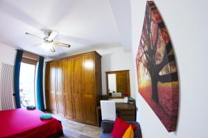 A bed or beds in a room at B&B Selvarossa