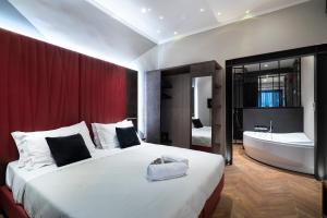 Кровать или кровати в номере Artemide Guest House