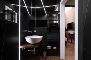 Ванная комната в Artemide Guest House