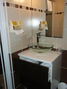 Et badeværelse på Cit'Hotel Europeen
