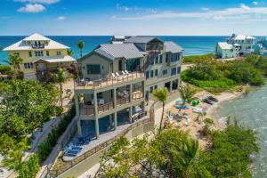an aerial view of a resort with the ocean at Nirvana Shores in Stuart
