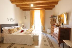 Posteľ alebo postele v izbe v ubytovaní "Suliscenti" Dimora Siciliana B&B