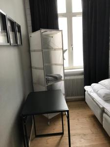 Postel nebo postele na pokoji v ubytování Vintergatans Rum