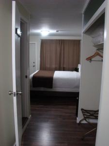 Postelja oz. postelje v sobi nastanitve Paddock Inn