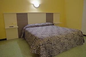 Cama o camas de una habitación en Hotel La Masía