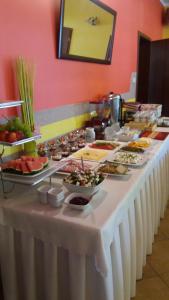 a buffet line with many different types of food at Posejdon in Grzybowo