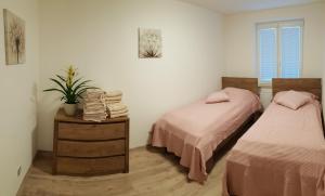 Postel nebo postele na pokoji v ubytování Apartmán U Labe
