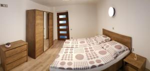 Postel nebo postele na pokoji v ubytování Apartmán U Labe