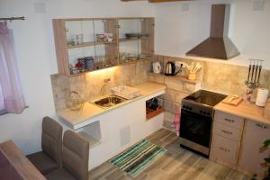 Kuchyňa alebo kuchynka v ubytovaní Veritas Apartments