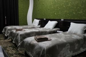 Postel nebo postele na pokoji v ubytování Hotel Zarafshon in Dushanbe + 37 fotografií