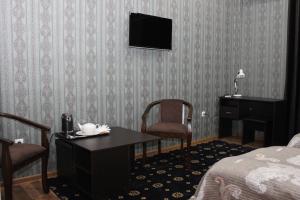 Postel nebo postele na pokoji v ubytování Hotel Zarafshon in Dushanbe