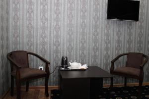 TV a/nebo společenská místnost v ubytování Hotel Zarafshon in Dushanbe