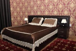 Postel nebo postele na pokoji v ubytování Hotel Zarafshon in Dushanbe