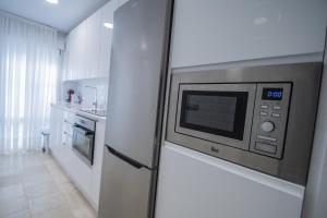 Kuchyňa alebo kuchynka v ubytovaní Apartamento Sueño de la Caleta