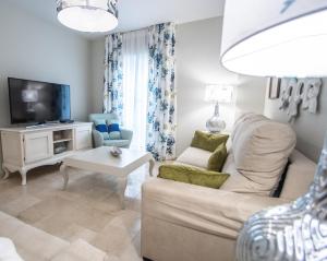 Televízia a/alebo spoločenská miestnosť v ubytovaní Apartamento Sueño de la Caleta
