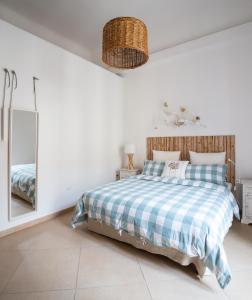 Ліжко або ліжка в номері Isola Blu