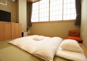 מיטה או מיטות בחדר ב-Arakawa-ku - Hotel / Vacation STAY 21946