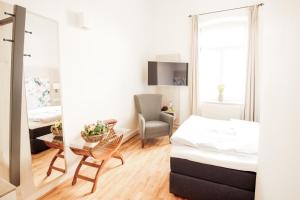 Postel nebo postele na pokoji v ubytování Denner Hotel