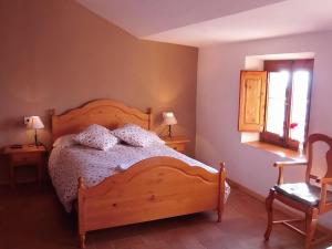 Posteľ alebo postele v izbe v ubytovaní Rectoria de Montclar- habitatge d'ús turístic -apartament