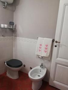 Koupelna v ubytování Il ghiro + 14 fotografií