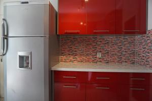 Kuchyň nebo kuchyňský kout v ubytování Deluxe Apartman Pervan