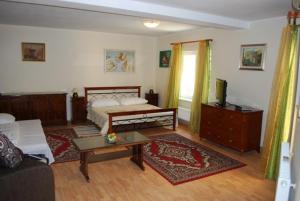 Una cama o camas en una habitación de Penzion da Giacomo
