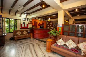 Χώρος καθιστικού στο Hotel Orchid
