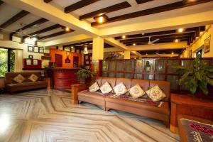 Χώρος καθιστικού στο Hotel Orchid