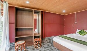 Postel nebo postele na pokoji v ubytování Itsy Hotels Jammabane Cottage