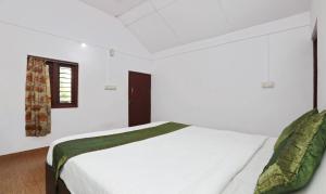 Postel nebo postele na pokoji v ubytování Itsy Hotels Jammabane Cottage