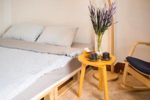 Postel nebo postele na pokoji v ubytování La Ava’s Home