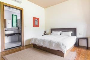 Letto o letti in una camera di Ville Greensward