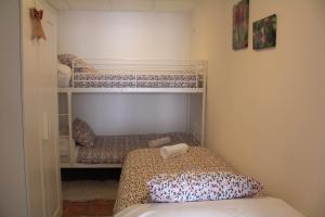 Postel nebo postele na pokoji v ubytování Apartamento con jardín Casa Mendiluce