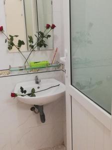 Um banheiro em Hoang Kim Hotel