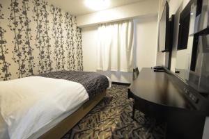 Postel nebo postele na pokoji v ubytování APA Hotel Mie Kameyama + 37 fotografií