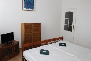 Postel nebo postele na pokoji v ubytování Hotel Černý kůň