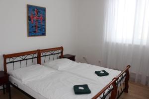 Postel nebo postele na pokoji v ubytování Hotel Černý kůň