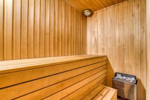 a wooden sauna with a wooden bench in it at Eco Hotel Noviy Kovtcheg in Gorodets