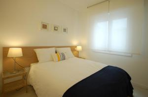 Posteľ alebo postele v izbe v ubytovaní Lets Holidays Carbonera 3 apartment
