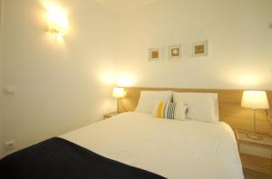 Posteľ alebo postele v izbe v ubytovaní Lets Holidays Carbonera 3 apartment