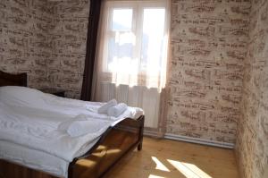 Postel nebo postele na pokoji v ubytování Guesthouse Qarim