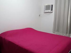 Krevet ili kreveti u jedinici u objektu Casa em Condomínio