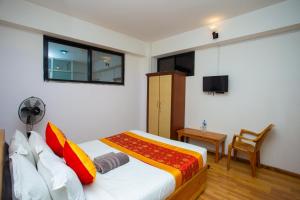 TV a/nebo společenská místnost v ubytování The Boudha Inn