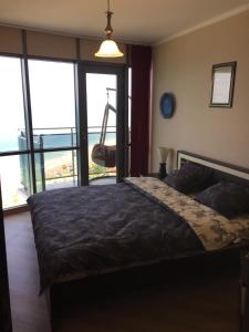 Кровать или кровати в номере Sea Towers 2309