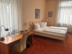 Postel nebo postele na pokoji v ubytování Hotel Ariston