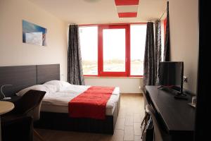 TV a/nebo společenská místnost v ubytování TOP HOTEL